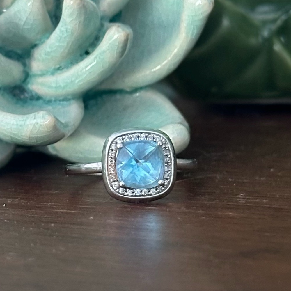 White gold 14k and blue topaz ring with diamond halo. 7